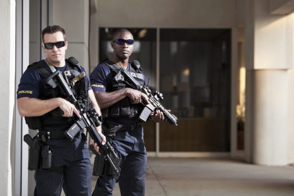 Police officers with rifles