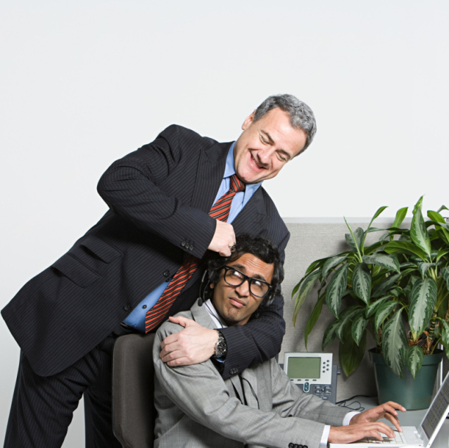 businessman-headlock-on-it-guy