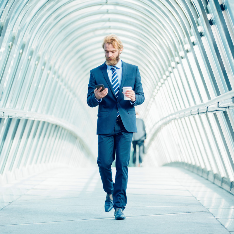 Businessman walking in financial district