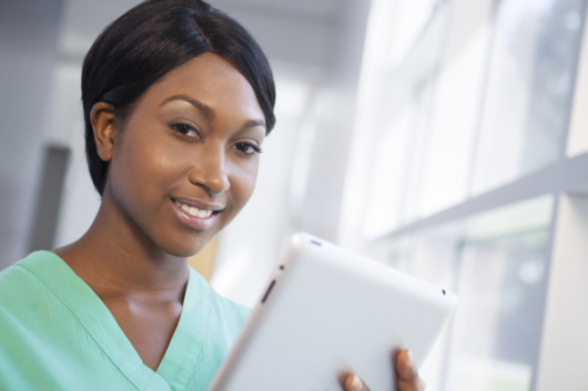 Nurse with tablet computer