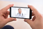 Man Video Chatting With Doctor